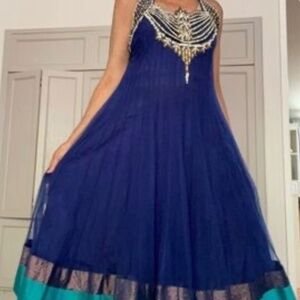 Deep blue maxi gown with embroidered rhinestones.